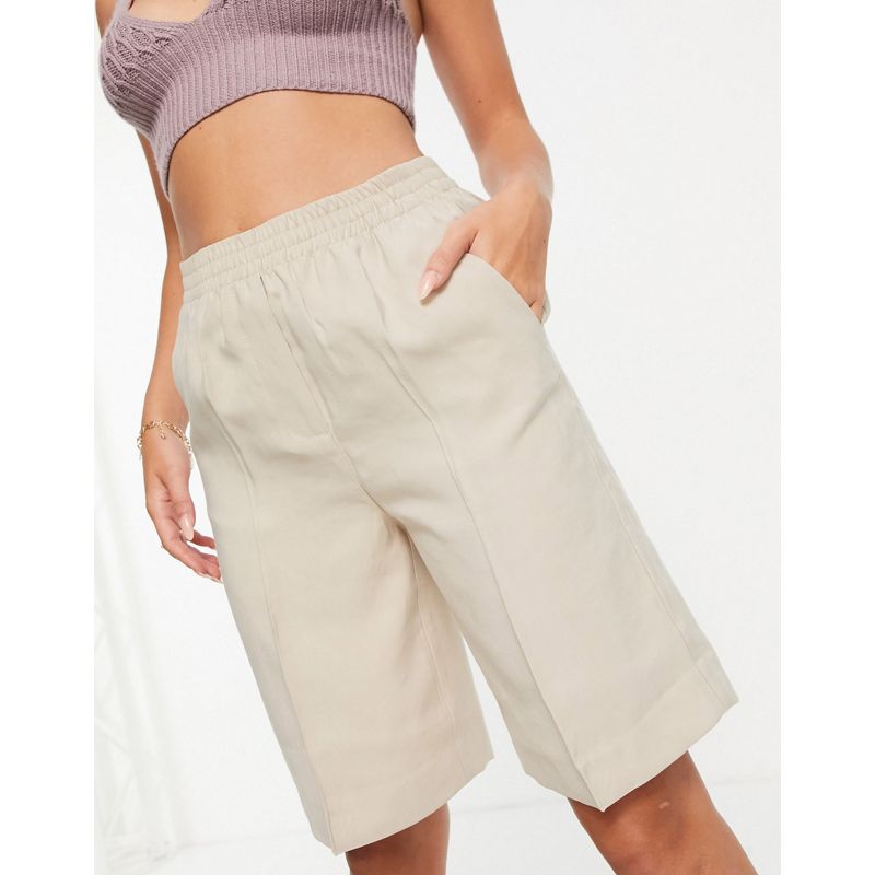 Mango – Elegante, lange Shorts in Beige